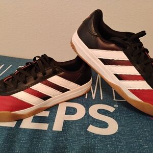 adidas Black, Red, and White Athletic Shoes